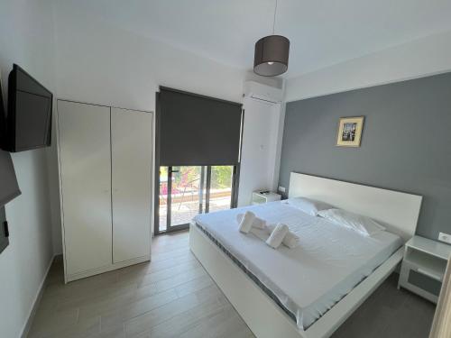 Кровать или кровати в номере La Casa Al Mare