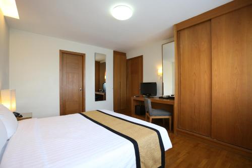 Ένα ή περισσότερα κρεβάτια σε δωμάτιο στο Kantary Hotel Ayutthaya