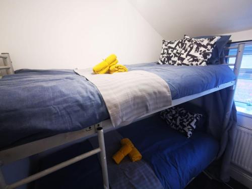 Säng eller sängar i ett rum på Single Room - Sutherland Place