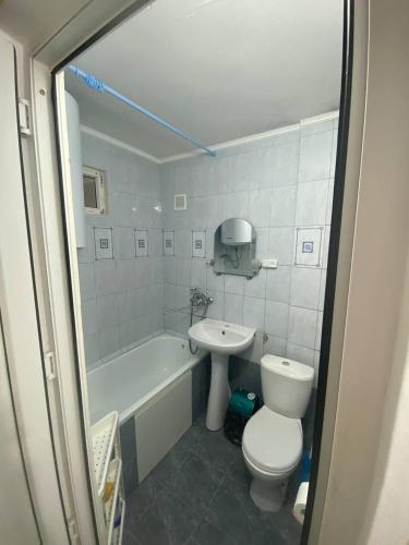 Koupelna v ubytování Квартира трёхкомнатная