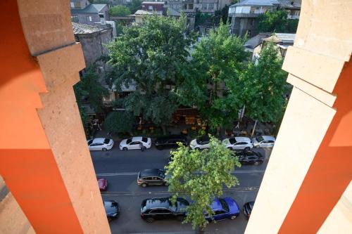 an aerial view of a parking lot with cars at Royal Plaza by Stellar Hotels, Yerevan in Yerevan