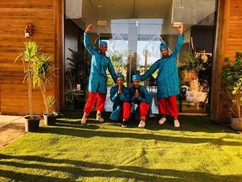 a group of three people posing for a picture at Tunis Pyramids Hotel - فندق اهرامات تونس in Tunis