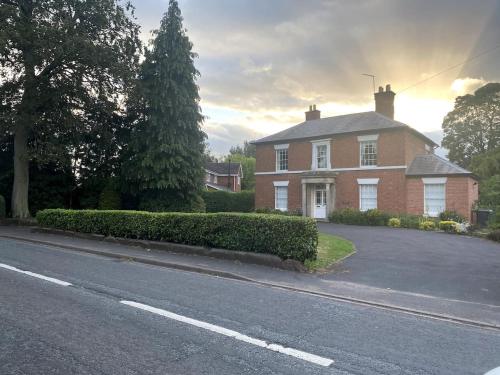 a house on the side of a street at Creamore Grove Wem Shrewsbury in Wem