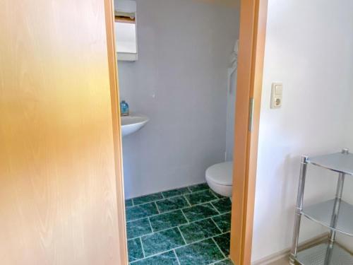 Ένα μπάνιο στο Ferienwohnung Jana