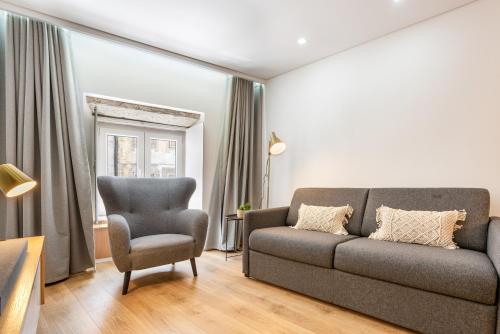 Posezení v ubytování Dom Miguel Apartment By Sé Apartamentos