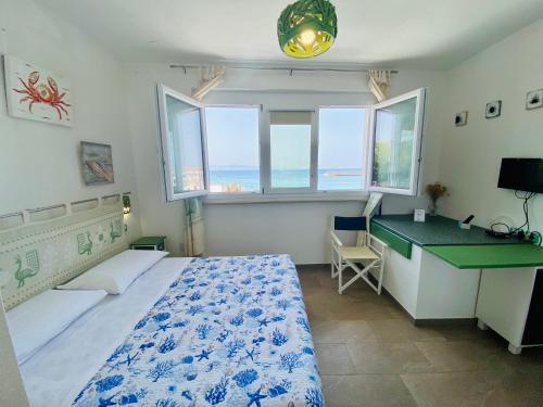 Postel nebo postele na pokoji v ubytování Casetta al mare