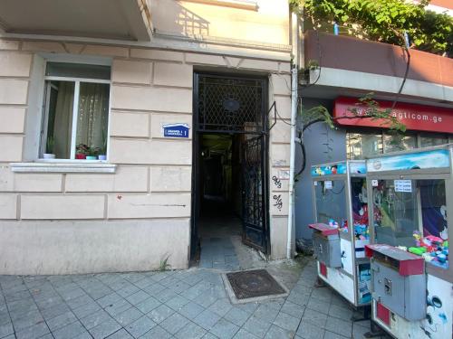 an entrance to a building with a door open at CASA NEPTUN in OLD BATUMI in Batumi