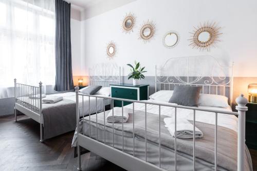 Postel nebo postele na pokoji v ubytování Kazimierz Friendhouse Apartments