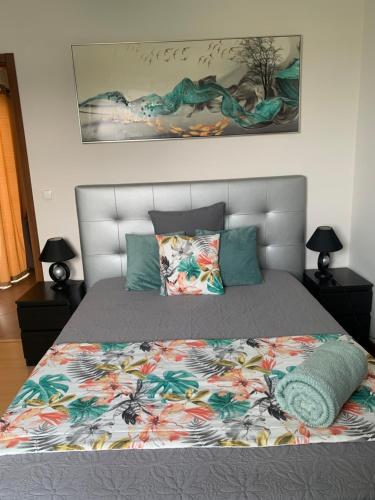 Ένα ή περισσότερα κρεβάτια σε δωμάτιο στο casa da rochinha