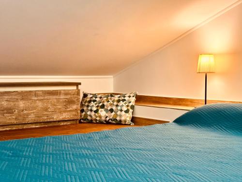 Postel nebo postele na pokoji v ubytování Laura Guest House Sasso di Castalda