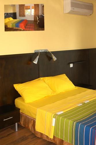 Кровать или кровати в номере Rainbow Bay Ozdere Nature and Beach Hotel