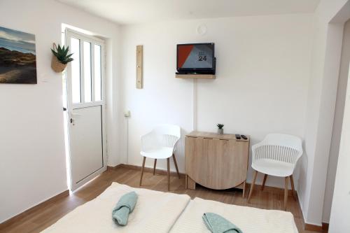 TV a/nebo společenská místnost v ubytování Comfy Studio in Ankaran JB4