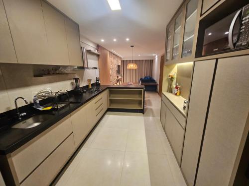 A cozinha ou kitchenette de Villa Andorinha apartamento 12