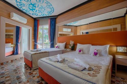 Postel nebo postele na pokoji v ubytování ANJELİQ SOCIAL HUB