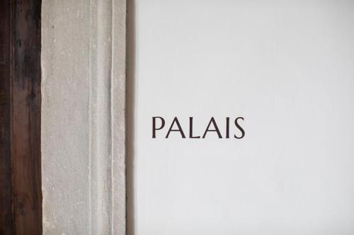a sign with the word paljas on a wall at Ansitz Montani Eppan in Appiano sulla Strada del Vino