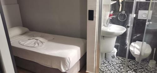 Kúpeľňa v ubytovaní Aslan Sand & City Hotel