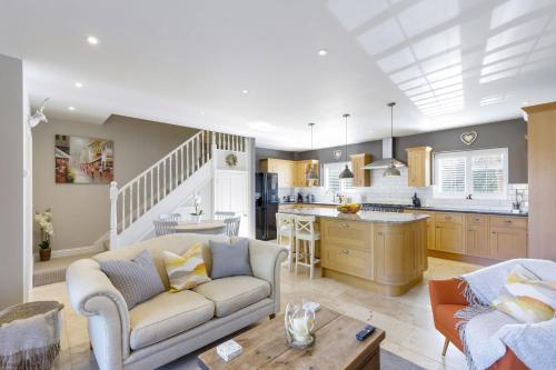 Kuchyň nebo kuchyňský kout v ubytování Mayaro Cottage by inspirestays-com