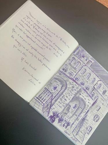 a page of a book with a drawing of a building at Cocon ardéchois in Aubenas