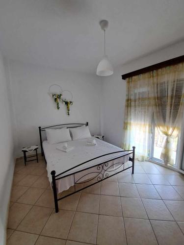 Ένα ή περισσότερα κρεβάτια σε δωμάτιο στο SUNDAY HOUSE
