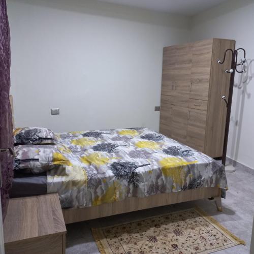 Ένα ή περισσότερα κρεβάτια σε δωμάτιο στο residence djerba 2