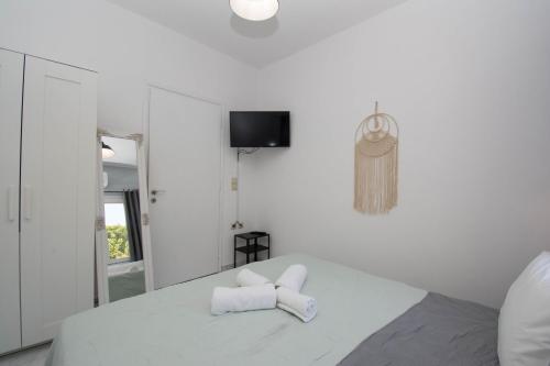 Postel nebo postele na pokoji v ubytování Jasmine Suites "By Checkin"