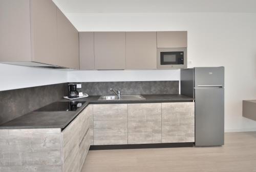 Η κουζίνα ή μικρή κουζίνα στο Condominio Aliante