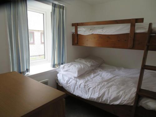 Postel nebo postele na pokoji v ubytování 11 Trevithick Court Tolroy Manor