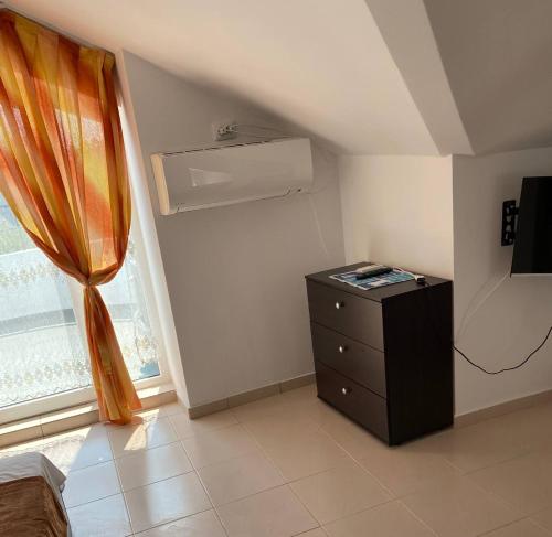 TV a/nebo společenská místnost v ubytování Къща за гости CANAVAN'S