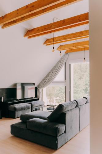 a living room with two couches and a couch at Anaberg in Nowa Ruda