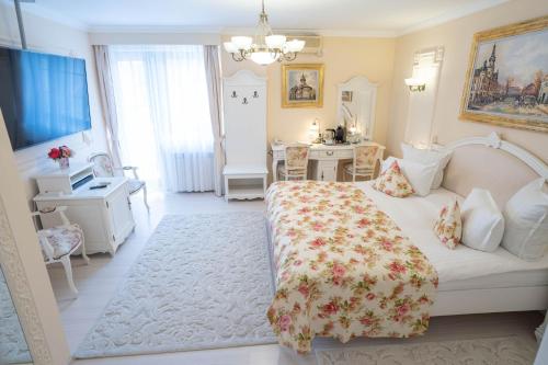 Postel nebo postele na pokoji v ubytování Villa Alice