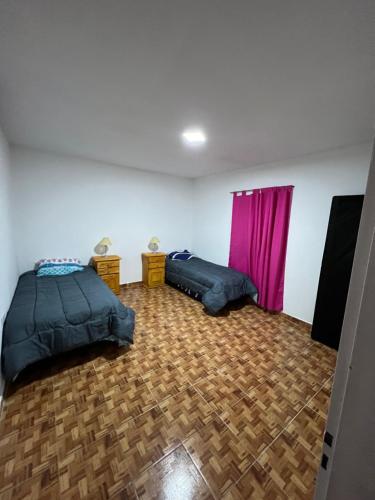 Postel nebo postele na pokoji v ubytování Apart Hotel Del Sol