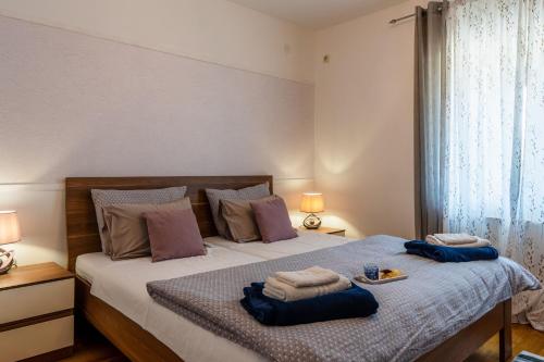 Postel nebo postele na pokoji v ubytování Apartment Olea