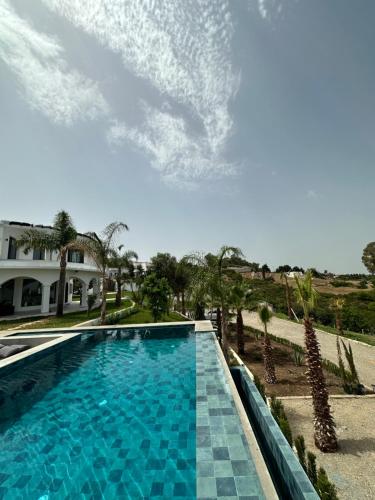 Swimming pool sa o malapit sa Villa Marina Hills - Tamuda Bay