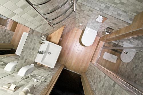 Koupelna v ubytování SPA VILNIUS Druskininkai