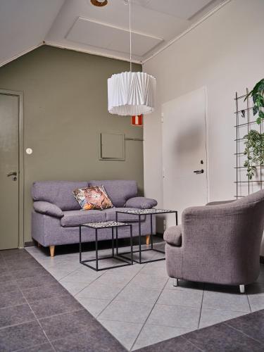Χώρος καθιστικού στο Herrestad Bed & Guestroom