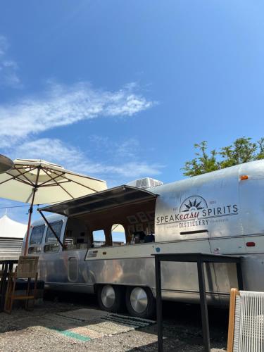 a truck parked in a parking lot with an umbrella at ViewPoint Hotel in York