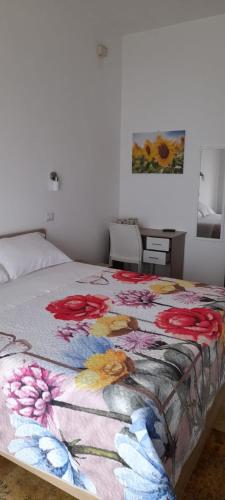 Postel nebo postele na pokoji v ubytování B&B Don Orlando