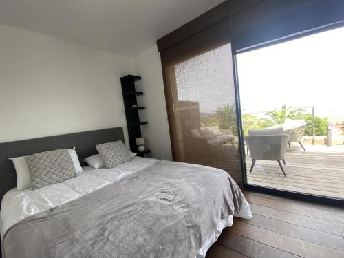 Postel nebo postele na pokoji v ubytování Magnifique villa vue mer avec piscine