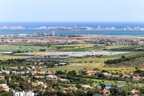 an aerial view of a city and the ocean at Villa Monte Leon 7 in Atamaría