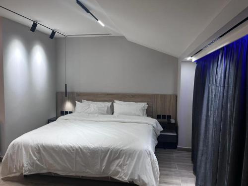 Cama o camas de una habitación en Aley Suites