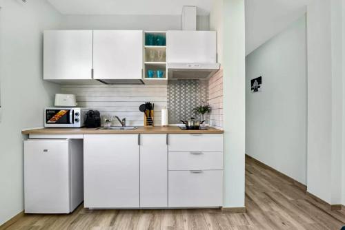 Kuchyň nebo kuchyňský kout v ubytování Umihouse apartamentos centro Alicante