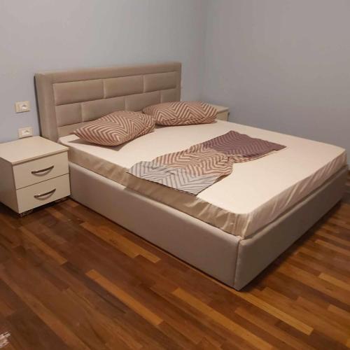 a bed with two pillows on it in a bedroom at Villa Spinarica in Zverneci
