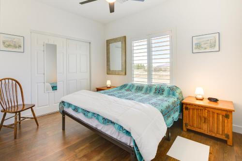 A bed or beds in a room at Serene Pahrump Cottage with Mountain Views!