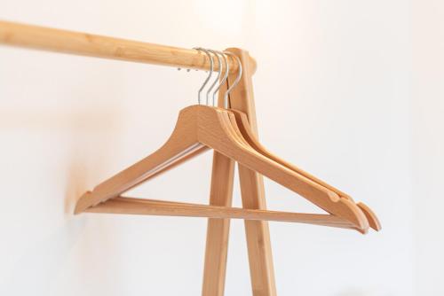 a wooden christmas hanger hanging from a wall at La Piazzetta in Iseo