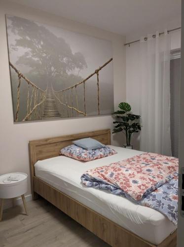 Postel nebo postele na pokoji v ubytování Luxoro Apartament