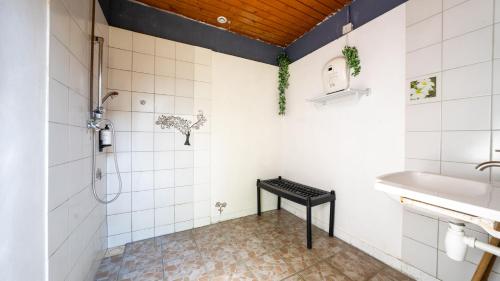a bathroom with a shower and a sink at Le Village de la Champagne - Slowmoov in Bar-sur-Aube