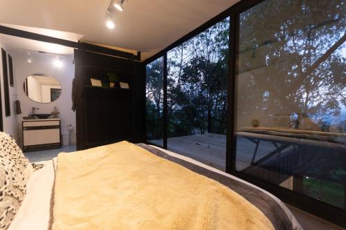 Postel nebo postele na pokoji v ubytování ZIRUMA HOUSE