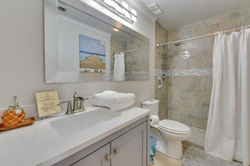 a bathroom with a sink and a toilet and a shower at Stewart House in the Beautiful SeaScape Resort in Destin