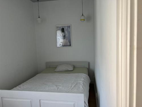 a small bedroom with a small bed in a room at Apartamenty Rajcza in Rajcza