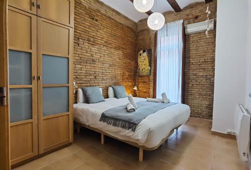 Posteľ alebo postele v izbe v ubytovaní Enjoy Apartment 4 pax at Ruzafa with sunny terrace